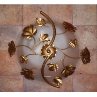 LAMPADARIO in Ferro Battuto . Dimensioni cm 45 x 20 circa .Colore Oro . 243