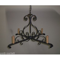 Wrought Iron Chandelier. Dimensions cm 75 x h 44 approx .  Iron color . 4 Lights with candles . 276