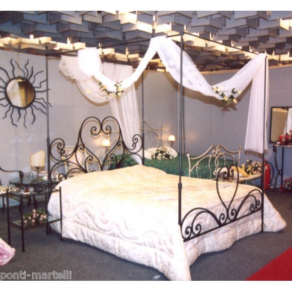 Wrought iron bed. Double . Canopy headboard and footboard . Colour Iron. 999